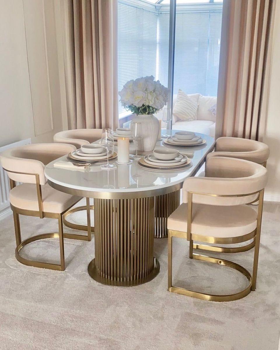 Premium dining table with gold base and chairs
